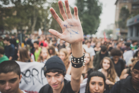 MILAN, ITALY - OCTOBER 10: Students manifestation held in Milan on October, 10 2014. Students took to the streets to protest against school italian reform and against milan expoのeditorial素材