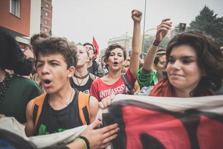 MILAN, ITALY - OCTOBER 10: Students manifestation held in Milan on October, 10 2014. Students took to the streets to protest against school italian reform and against milan expoのeditorial素材