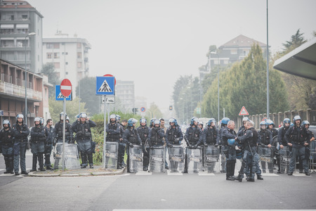 MILAN, ITALY - OCTOBER 10: Students manifestation held in Milan on October, 10 2014. Students took to the streets to protest against school italian reform and against milan expoのeditorial素材