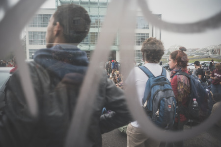 MILAN, ITALY - OCTOBER 10: Students manifestation held in Milan on October, 10 2014. Students took to the streets to protest against school italian reform and against milan expoのeditorial素材