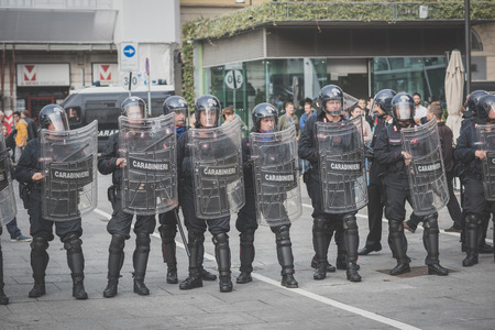 MILAN, ITALY - OCTOBER 11: demonstration held in Milan october 11, 2014. Police during protest against Milan expo to be held in 2015, event important worldwide.のeditorial素材