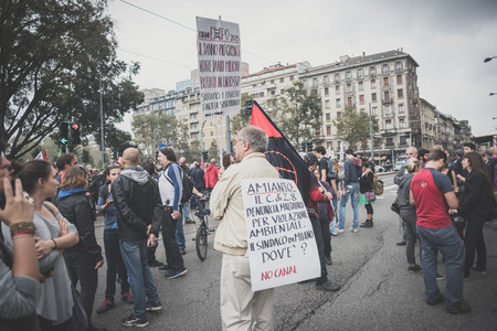 MILAN, ITALY - OCTOBER 11: demonstration held in Milan october 11, 2014. People took streets to protest against Milan expo to be held in 2015, event important worldwide.のeditorial素材