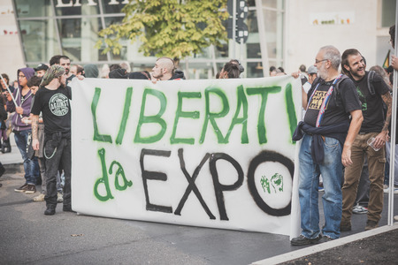 MILAN, ITALY - OCTOBER 11: demonstration held in Milan october 11, 2014. People took streets to protest against Milan expo to be held in 2015, event important worldwide.のeditorial素材