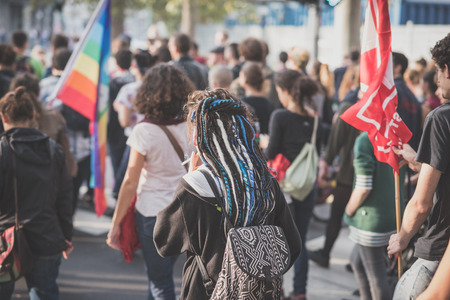 MILAN, ITALY - OCTOBER 11: demonstration held in Milan october 11, 2014. People took streets to protest against Milan expo to be held in 2015, event important worldwide.のeditorial素材