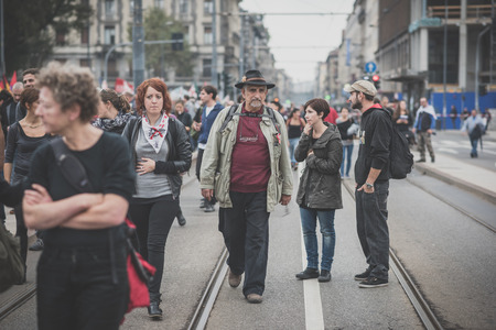 MILAN, ITALY - OCTOBER 11: demonstration held in Milan october 11, 2014. People took streets to protest against Milan expo to be held in 2015, event important worldwide.のeditorial素材