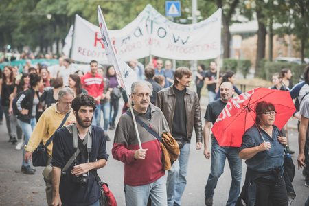 MILAN, ITALY - OCTOBER 11: demonstration held in Milan october 11, 2014. People took streets to protest against Milan expo to be held in 2015, event important worldwide.のeditorial素材