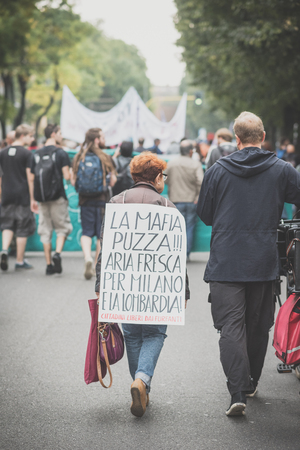 MILAN, ITALY - OCTOBER 11: demonstration held in Milan october 11, 2014. People took streets to protest against Milan expo to be held in 2015, event important worldwide.のeditorial素材