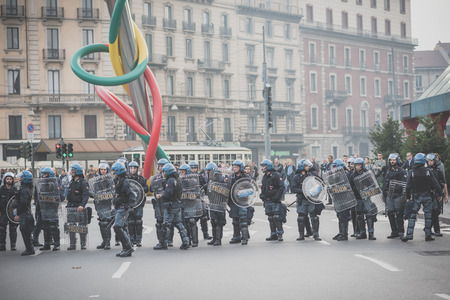 MILAN, ITALY - OCTOBER 11: demonstration held in Milan october 11, 2014. Police during protest against Milan expo to be held in 2015, event important worldwide.のeditorial素材
