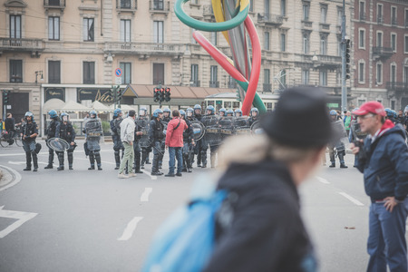 MILAN, ITALY - OCTOBER 11: demonstration held in Milan october 11, 2014. Police during protest against Milan expo to be held in 2015, event important worldwide.のeditorial素材