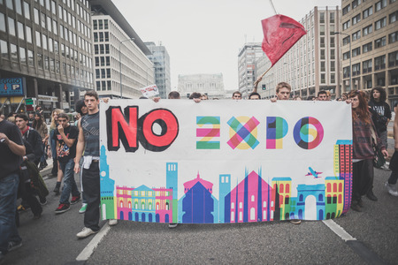 MILAN, ITALY - OCTOBER 11: demonstration held in Milan october 11, 2014. People took streets to protest against Milan expo to be held in 2015, event important worldwide.のeditorial素材
