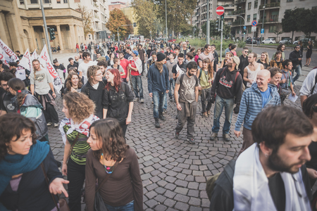 MILAN, ITALY - OCTOBER 11: demonstration held in Milan october 11, 2014. People took streets to protest against Milan expo to be held in 2015, event important worldwide.のeditorial素材