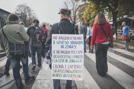 MILAN, ITALY - OCTOBER 11: demonstration held in Milan october 11, 2014. People took streets to protest against Milan expo to be held in 2015, event important worldwide.のeditorial素材