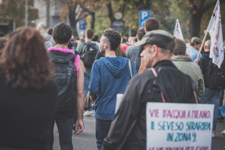 MILAN, ITALY - OCTOBER 11: demonstration held in Milan october 11, 2014. People took streets to protest against Milan expo to be held in 2015, event important worldwide.のeditorial素材
