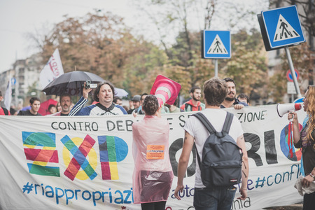 MILAN, ITALY - OCTOBER 11: demonstration held in Milan october 11, 2014. People took streets to protest against Milan expo to be held in 2015, event important worldwide.のeditorial素材