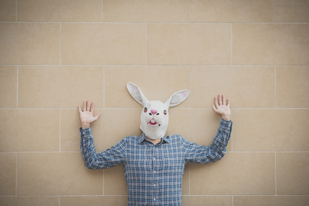 rabbit mask absurd man in the cityの写真素材