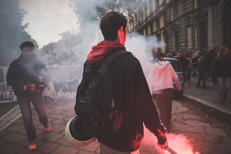 MILAN, ITALY - NOVEMBER 14: Student demonstration held in Milan November 14, 2014. Students took streets to protest against Milan expo to be held in 2015, event important worldwide.のeditorial素材