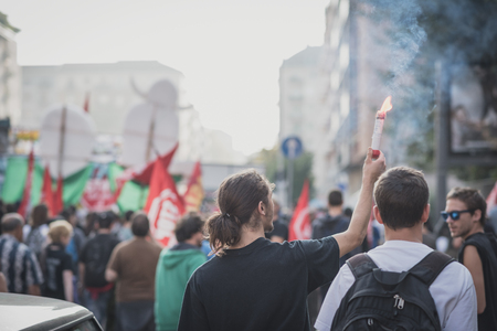 MILAN, ITALY - OCTOBER 18: manifestation held in Milan october 18, 2014. People took streets to protest against racism, war and against lega nord, right wing politic italian movementのeditorial素材