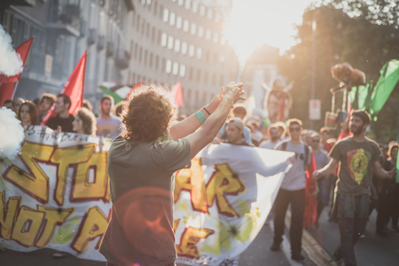 MILAN, ITALY - OCTOBER 18: manifestation held in Milan october 18, 2014. People took streets to protest against racism, war and against lega nord, right wing politic italian movementのeditorial素材