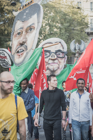 MILAN, ITALY - OCTOBER 18: manifestation held in Milan october 18, 2014. People took streets to protest against racism, war and against lega nord, right wing politic italian movementのeditorial素材
