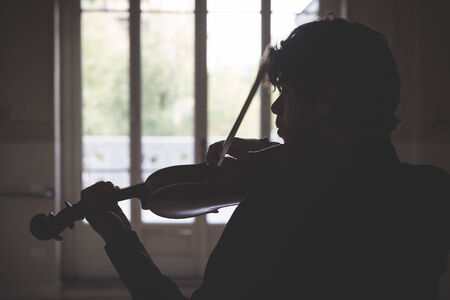 young handsome blonde italian violinistの写真素材