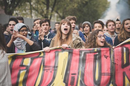 MILAN, ITALY - NOVEMBER 14: Student demonstration held in Milan November 14, 2014. Students took streets to protest against Milan expo to be held in 2015, event important worldwide.のeditorial素材