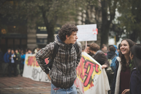 MILAN, ITALY - NOVEMBER 14: Student demonstration held in Milan November 14, 2014. Students took streets to protest against Milan expo to be held in 2015, event important worldwide.のeditorial素材
