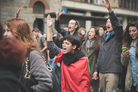 MILAN, ITALY - NOVEMBER 14: Student demonstration held in Milan November 14, 2014. Students took streets to protest against Milan expo to be held in 2015, event important worldwide.のeditorial素材