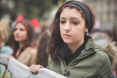 MILAN, ITALY - NOVEMBER 14: Student demonstration held in Milan November 14, 2014. Students took streets to protest against Milan expo to be held in 2015, event important worldwide.のeditorial素材