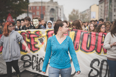 MILAN, ITALY - NOVEMBER 14: Student demonstration held in Milan November 14, 2014. Students took streets to protest against Milan expo to be held in 2015, event important worldwide.のeditorial素材