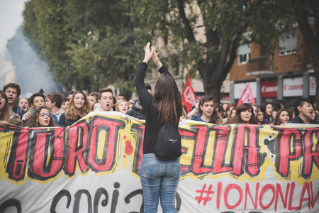 MILAN, ITALY - NOVEMBER 14: Student demonstration held in Milan November 14, 2014. Students took streets to protest against Milan expo to be held in 2015, event important worldwide.のeditorial素材