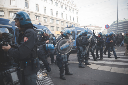 MILAN, ITALY - NOVEMBER 14: Student demonstration held in Milan November 14, 2014. police fighting against students during manifestationのeditorial素材