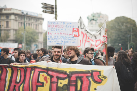 MILAN, ITALY - NOVEMBER 14: Student demonstration held in Milan November 14, 2014. Students took streets to protest against Milan expo to be held in 2015, event important worldwide.のeditorial素材