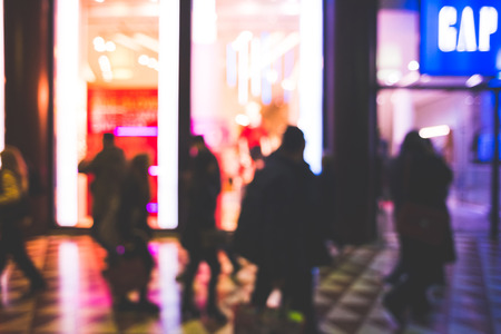blurred bokeh city milan by night in christmas timeの写真素材