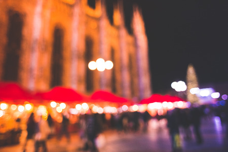 blurred bokeh city milan by night in christmas time