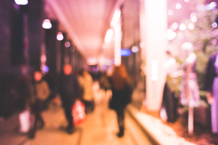 blurred bokeh city milan by night in christmas timeの写真素材