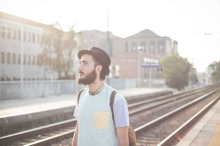 young handsome hipster gay modern man in townの写真素材