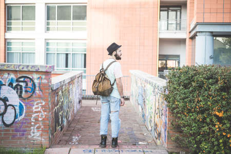 young handsome hipster gay modern man in townの写真素材