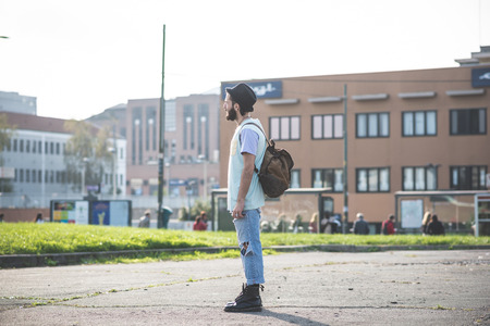 young handsome hipster gay modern man in townの写真素材