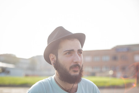 young handsome hipster gay modern man in townの写真素材