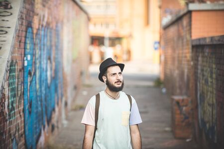 young handsome hipster gay modern man in townの写真素材