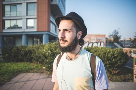 young handsome hipster gay modern man in town