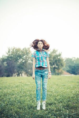 beautiful young hipster woman in the city