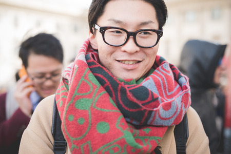 MILAN, ITALY - FEBRUARY 25: People during Milan Fashion week, Italy on February, 25 2015. Eccentric and fashionable people outside city during Milan fashion week wait for models and famous peopleのeditorial素材