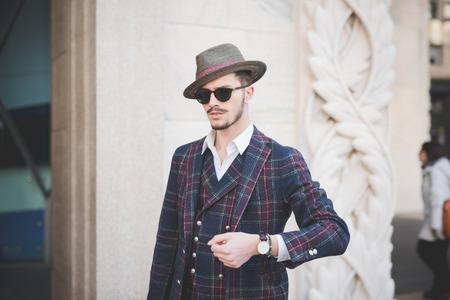 MILAN, ITALY - FEBRUARY 25: People during Milan Fashion week, Italy on February, 25 2015. Eccentric and fashionable people outside city during Milan fashion week wait for models and famous peopleのeditorial素材