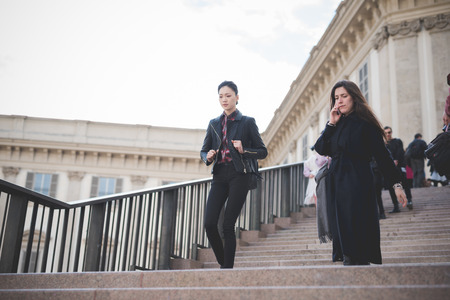 MILAN, ITALY - FEBRUARY 25: People during Milan Fashion week, Italy on February, 25 2015. Eccentric and fashionable people outside city during Milan fashion week wait for models and famous peopleのeditorial素材