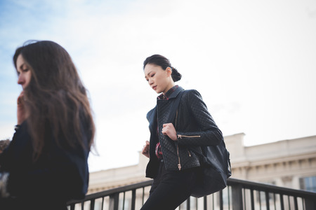 MILAN, ITALY - FEBRUARY 25: People during Milan Fashion week, Italy on February, 25 2015. Eccentric and fashionable people outside city during Milan fashion week wait for models and famous peopleのeditorial素材