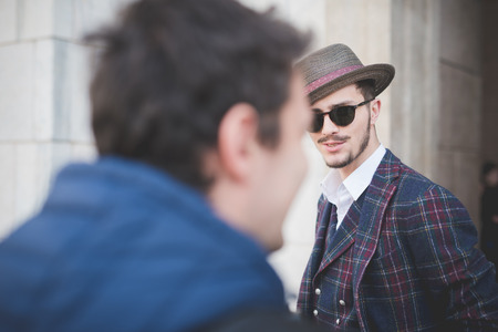 MILAN, ITALY - FEBRUARY 25: People during Milan Fashion week, Italy on February, 25 2015. Eccentric and fashionable people outside city during Milan fashion week wait for models and famous peopleのeditorial素材