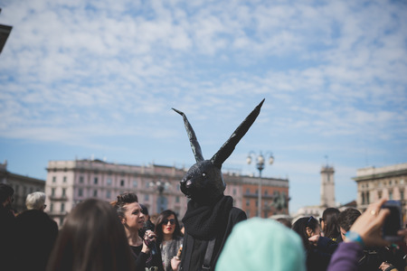 MILAN, ITALY - FEBRUARY 25: People during Milan Fashion week, Italy on February, 25 2015. Eccentric and fashionable people outside city during Milan fashion week wait for models and famous peopleのeditorial素材