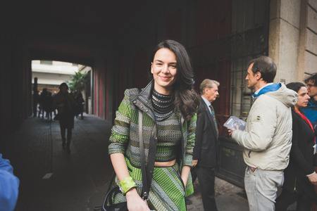 MILAN, ITALY - FEBRUARY 27: People during Milan Fashion week, Italy on February, 27 2015. Eccentric and fashionable people outside city during Milan fashion week wait for models and famous peopleのeditorial素材
