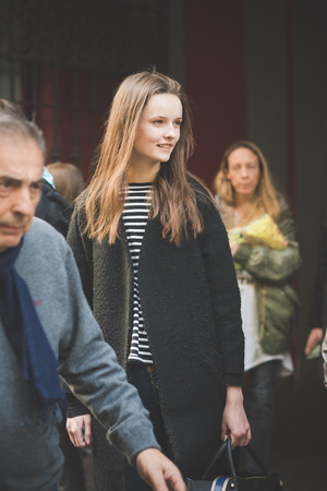 MILAN, ITALY - FEBRUARY 27: People during Milan Fashion week, Italy on February, 27 2015. Eccentric and fashionable people outside city during Milan fashion week wait for models and famous peopleのeditorial素材